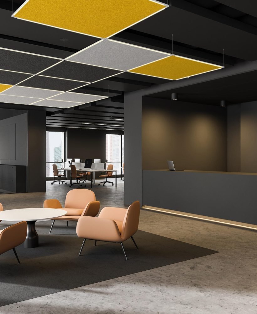 Corner of stylish office with gray walls, concrete floor, gray reception counter, lounge area with orange armchairs and coffee table, meeting room and open space area in background. 3d rendering